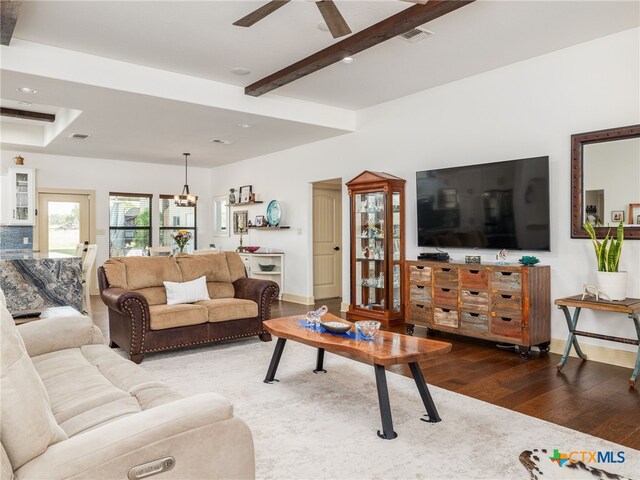 2091 County Road 100, Burnet, TX 78611 - living room featuring wood-type flooring, baseboards, ceiling fan, beam ceiling, and recessed lighting