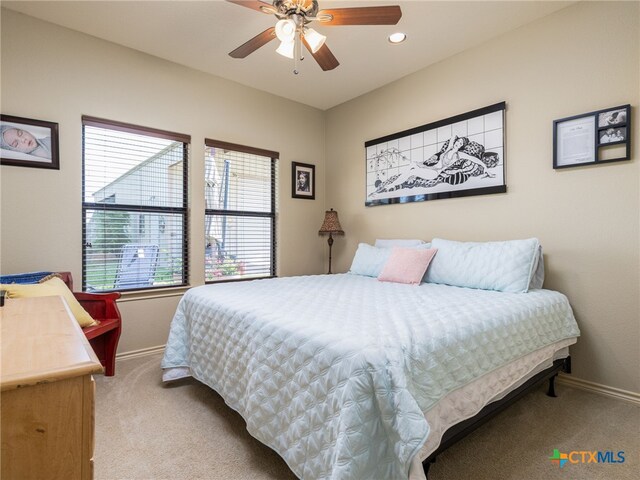 2091 County Road 100, Burnet, TX 78611 - bedroom featuring light colored carpet, baseboards, recessed lighting, and ceiling fan
