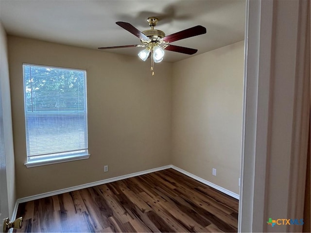 240 Ibis Falls Dr, New Braunfels, TX 78130 - empty room with healthy amount of natural light, dark wood-style flooring, baseboards, and a ceiling fan