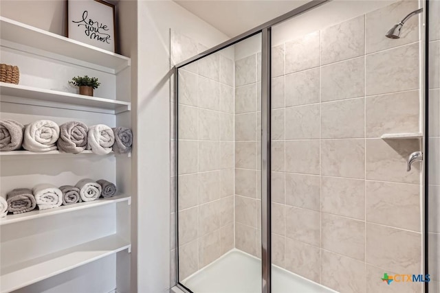 bathroom featuring walk in shower