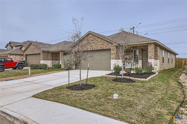 ranch-style house featuring a garage and a front lawn