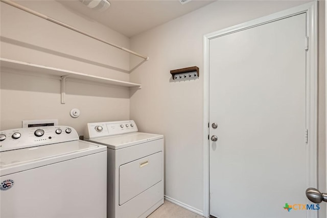 laundry area featuring washer and dryer