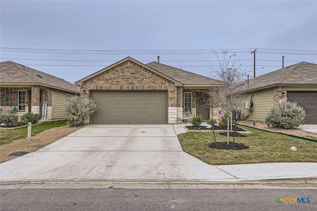 single story home with a garage and a front lawn