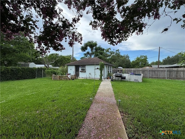 901 Broadmoor St, Victoria, TX 77904 - back of house with a fenced backyard