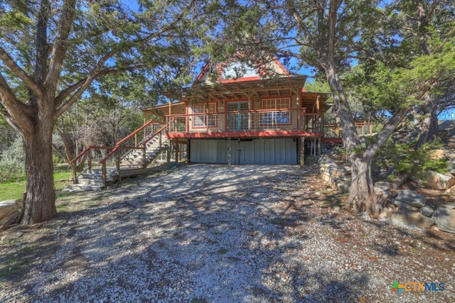 view of front of property with a deck