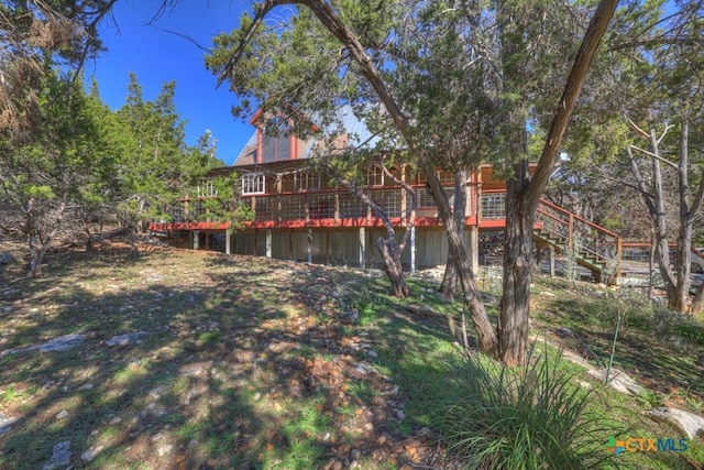 view of yard featuring a deck