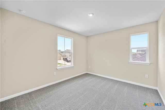 124 Jasmine Ln, Marble Falls, TX 78654 - empty room with carpet flooring and baseboards