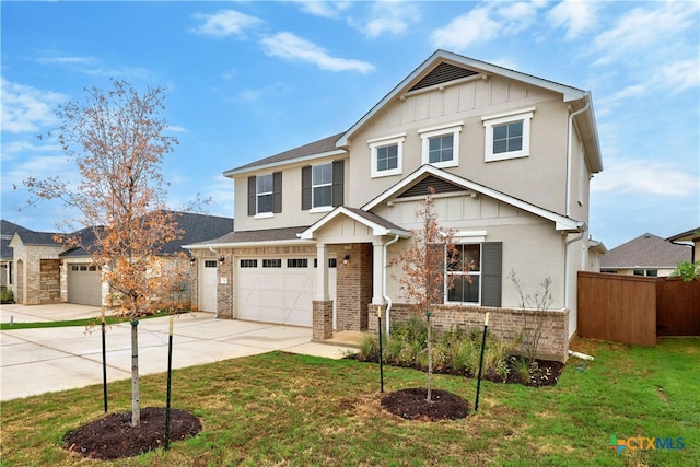 craftsman-style home with a front yard and a garage