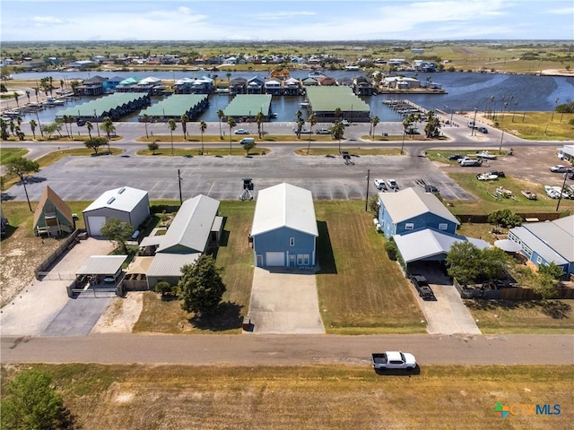 drone / aerial view with a water view