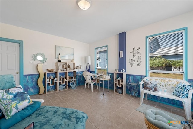 living room with tile patterned flooring