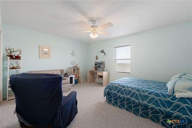 bedroom with ceiling fan and carpet