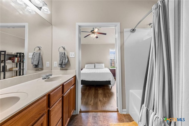 7831 Redbrush, Temple, TX 76502 - full bath featuring shower / bathtub combination with curtain, ensuite bath, double vanity, and ceiling fan