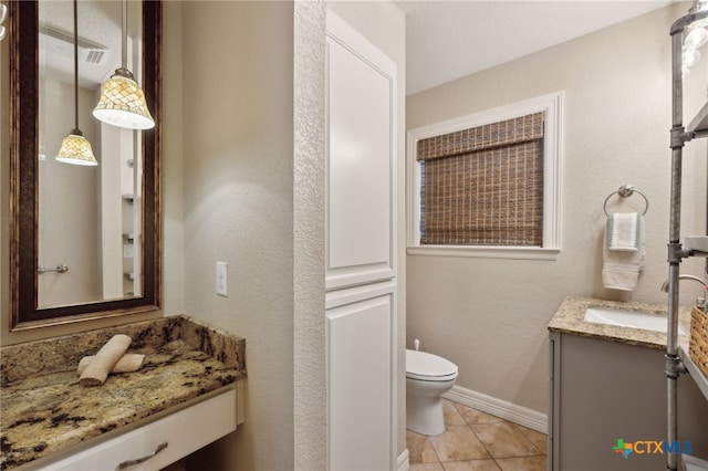 95 Mission Dr, New Braunfels, TX 78130 - bathroom with toilet, tile patterned flooring, vanity, and a textured wall
