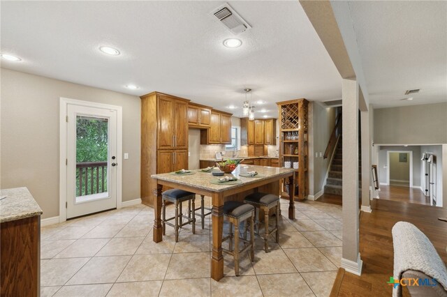 95 Mission Dr, New Braunfels, TX 78130 - dining space with baseboards, recessed lighting, stairway, and visible vents