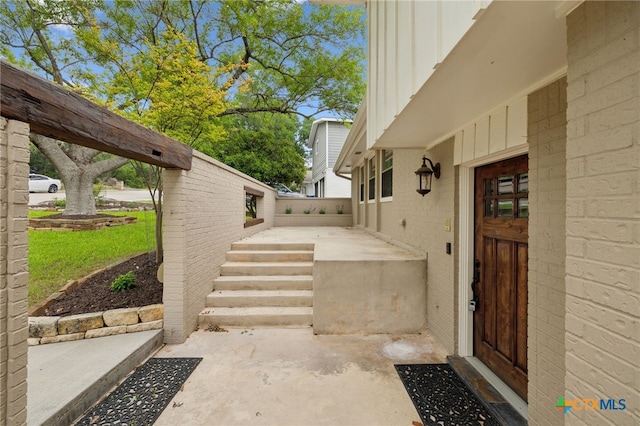 95 Mission Dr, New Braunfels, TX 78130 - property entrance with board and batten siding