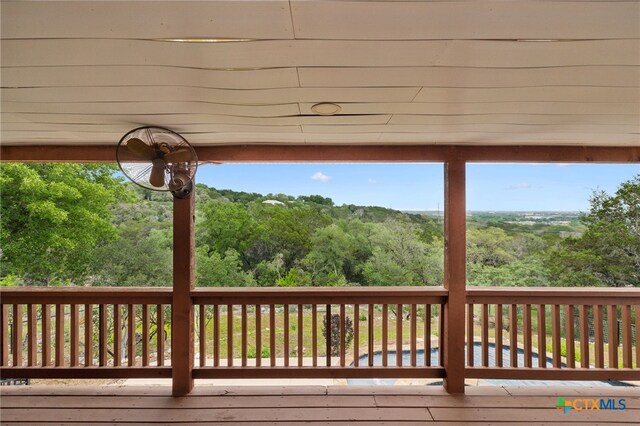 95 Mission Dr, New Braunfels, TX 78130 - wooden deck with a forest view