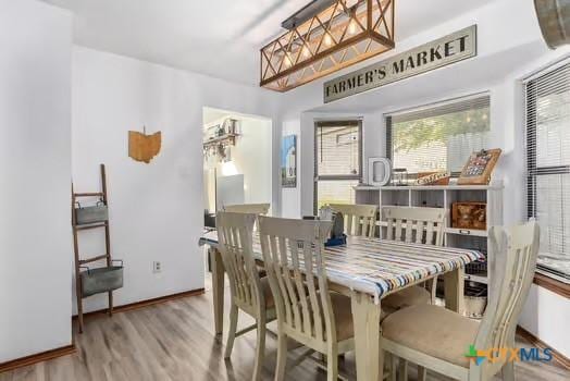 2305 Canyon Creek Dr, Temple, TX 76502 - dining space featuring wood finished floors and baseboards