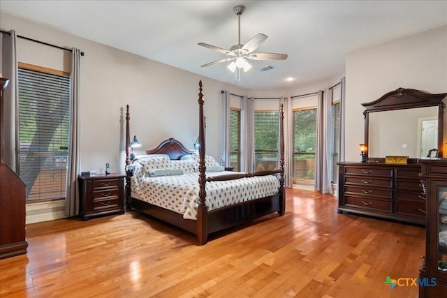 1800 Bluffwood Pl, Round Rock, TX 78665 - bedroom featuring multiple windows, light wood-style flooring, a ceiling fan, and recessed lighting