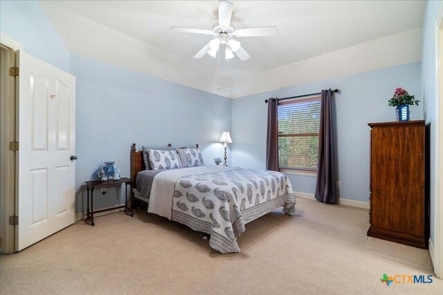 1800 Bluffwood Pl, Round Rock, TX 78665 - bedroom with light colored carpet, baseboards, and ceiling fan