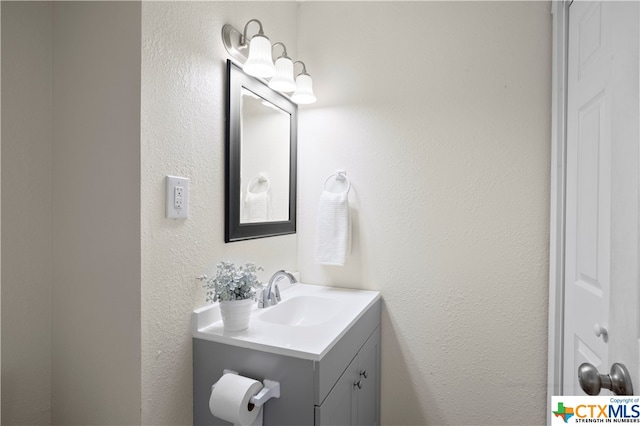 bathroom featuring vanity