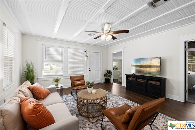 living room with dark hardwood / wood-style floors, ceiling fan, and beam ceiling