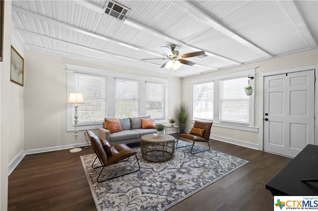 living room with ceiling fan and dark hardwood / wood-style floors