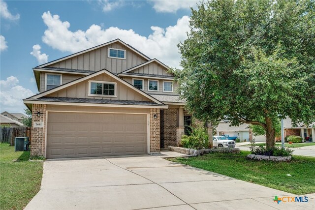 7631 Sterling Mnr, Converse, TX 78109 - craftsman house with brick siding, board and batten siding, concrete driveway, and a garage