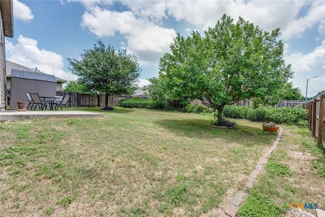 7631 Sterling Mnr, Converse, TX 78109 - fenced backyard with a patio area