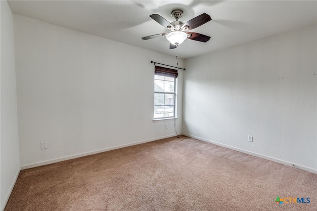 7631 Sterling Mnr, Converse, TX 78109 - spare room with light colored carpet and a ceiling fan