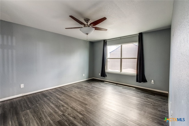 7631 Sterling Mnr, Converse, TX 78109 - unfurnished room with a ceiling fan and dark wood finished floors