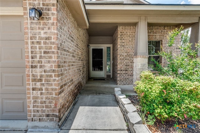 7631 Sterling Mnr, Converse, TX 78109 - view of exterior entry with brick siding and a garage