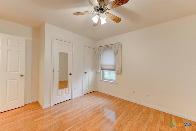 4700 Aurora Cir, Killeen, TX 76542 - unfurnished bedroom featuring light wood-type flooring, baseboards, multiple closets, and ceiling fan