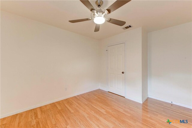 4700 Aurora Cir, Killeen, TX 76542 - unfurnished room featuring light wood-style floors, baseboards, and ceiling fan