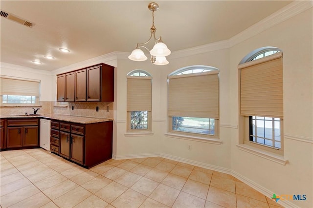 4700 Aurora Cir, Killeen, TX 76542 - kitchen featuring a chandelier, a sink, dishwasher, decorative backsplash, and crown molding