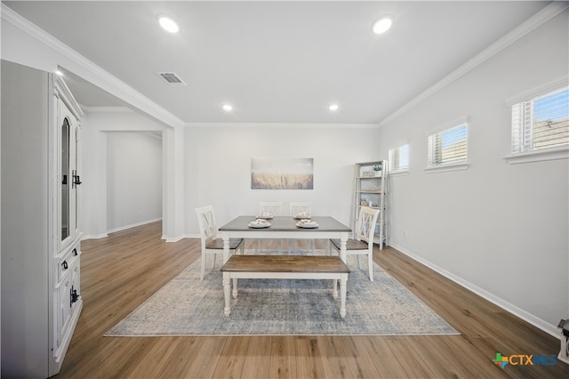 711 Saddlehorn Dr, Temple, TX 76502 - dining room with wood finished floors, baseboards, ornamental molding, and recessed lighting