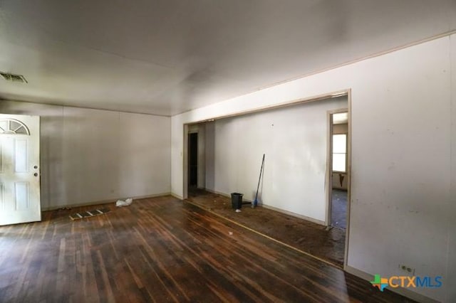 626 E Wallace St, Gonzales, TX 78629 - unfurnished room with hardwood / wood-style floors
