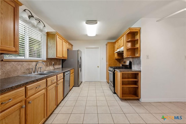 kitchen with open shelves, dark countertops, appliances with stainless steel finishes, a sink, and under cabinet range hood