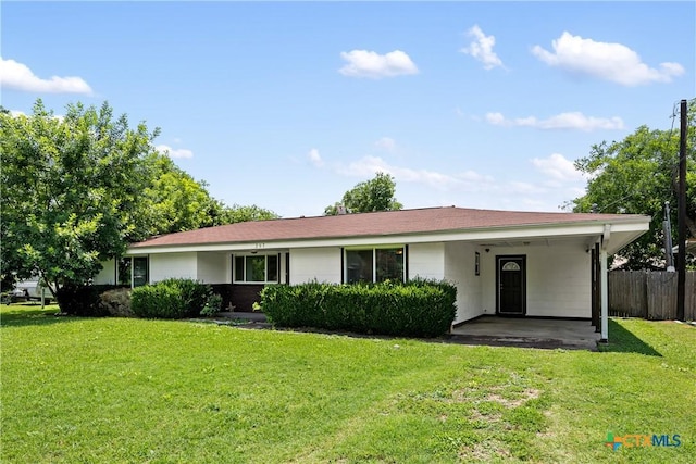 single story home featuring fence and a front yard