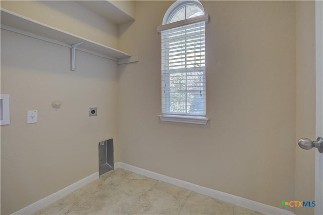 laundry room with gas dryer hookup and electric dryer hookup