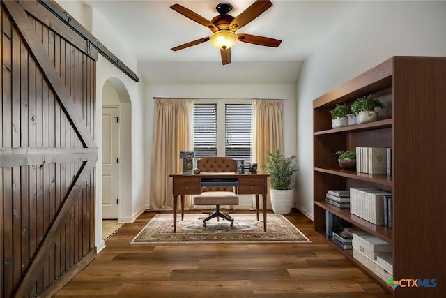 office area with dark hardwood / wood-style flooring and ceiling fan