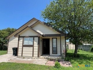 view of front of home with a front yard