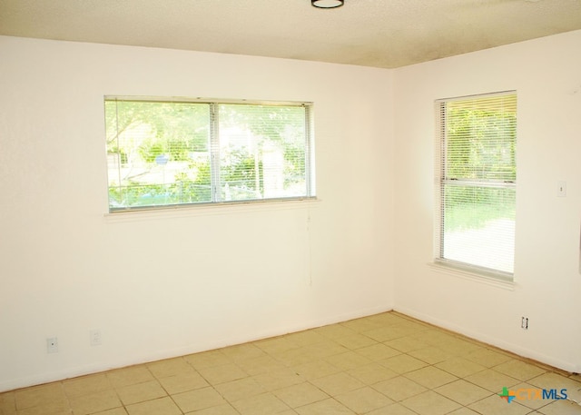 view of tiled empty room