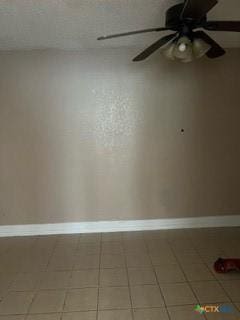 spare room featuring tile patterned floors