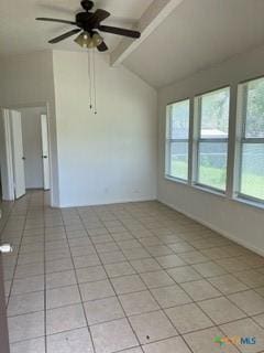 tiled empty room with lofted ceiling with beams and ceiling fan