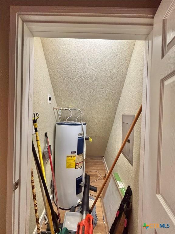 1306 W Madison Ave, Port Oconnor, TX 77982 - utilities featuring water heater and electric panel