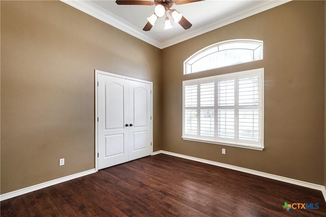 110 Agua Verde, Seguin, TX 78155 - unfurnished bedroom featuring wood finished floors, ornamental molding, baseboards, and a ceiling fan