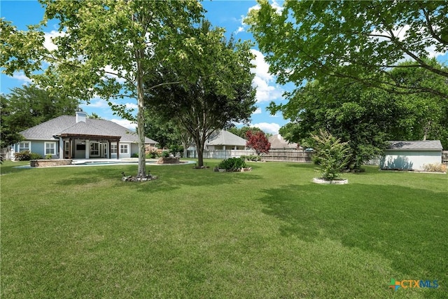 110 Agua Verde, Seguin, TX 78155 - view of yard featuring a patio, a pergola, and an outbuilding