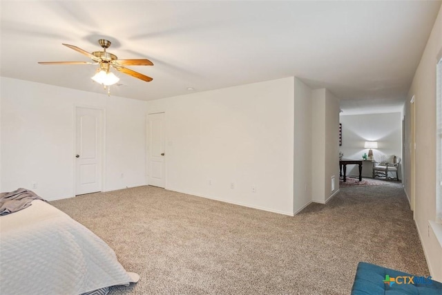 303 Harvest Mdw, Temple, TX 76502 - unfurnished bedroom featuring carpet, ceiling fan, and baseboards