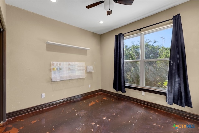 empty room featuring carpet and ceiling fan