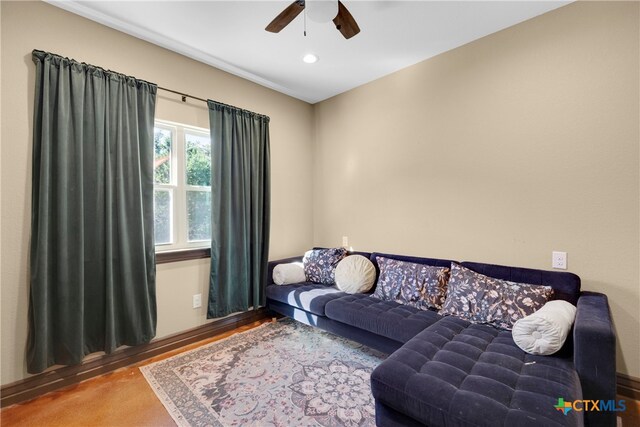 living room featuring ceiling fan